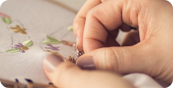 Hand embroidering a personalized keepsake